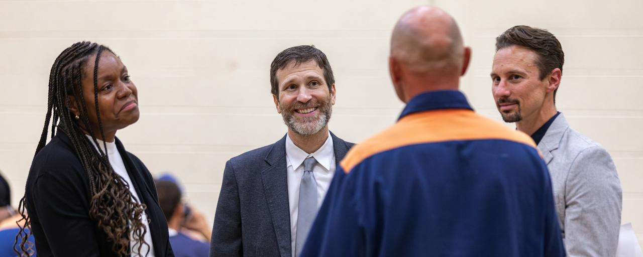 GVSU staff talking with a student